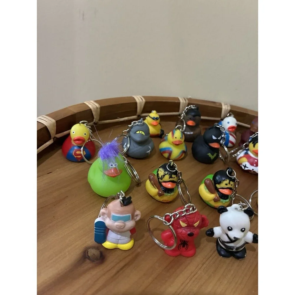 LOT OF 24 RUBBER DUCK AND MISC FIGURES  MINI KEY CHAINS